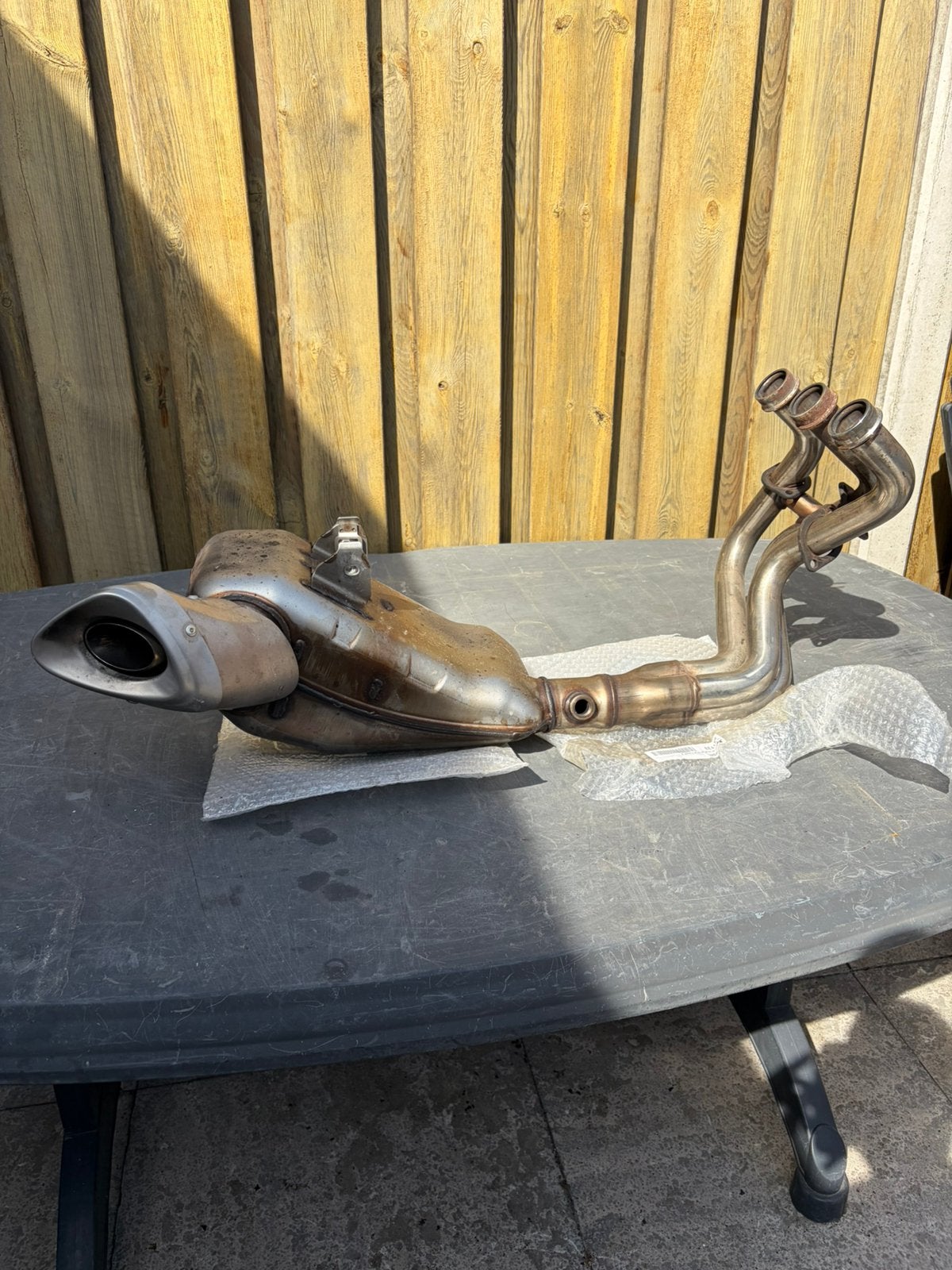 Orginele uitlaat Yamaha Tracer 900, Ophalen