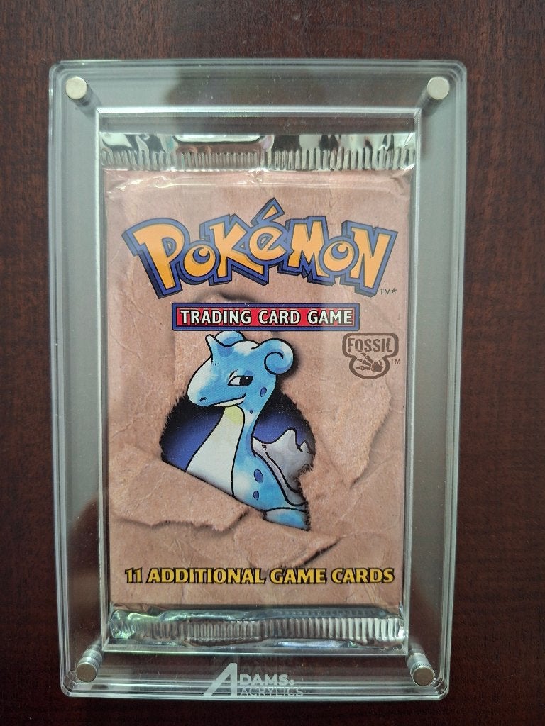 Pokemon / Fossil Booster Pack 1999, Hobby en Vrije tijd, Verzamelkaartspellen | Pokémon, Ophalen of Verzenden, Zo goed als nieuw