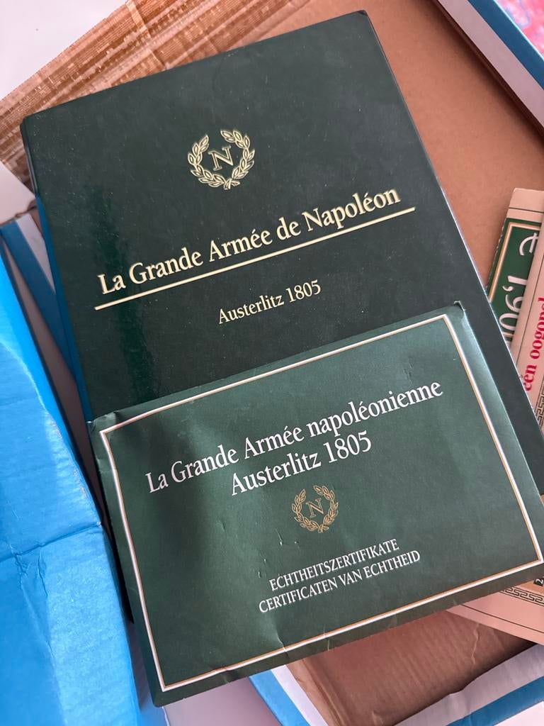 Tinnen soldaten en kanonnen met certificaten, Ophalen