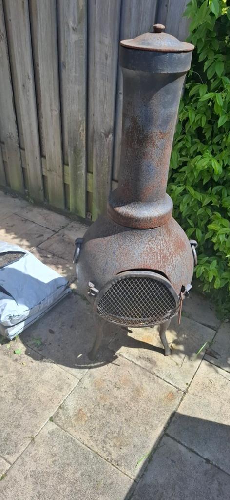 Oude gietijzeren tuinhaard, Ophalen, Gebruikt