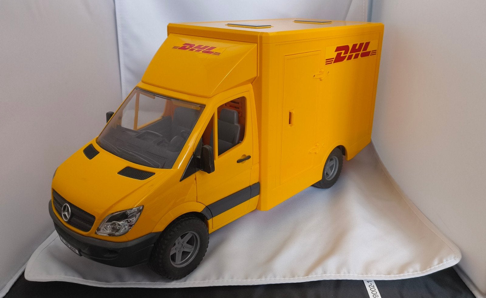 Bruder Mercedes-Benz Sprinter DHL met heftruck, Ophalen of Verzenden, Zo goed als nieuw
