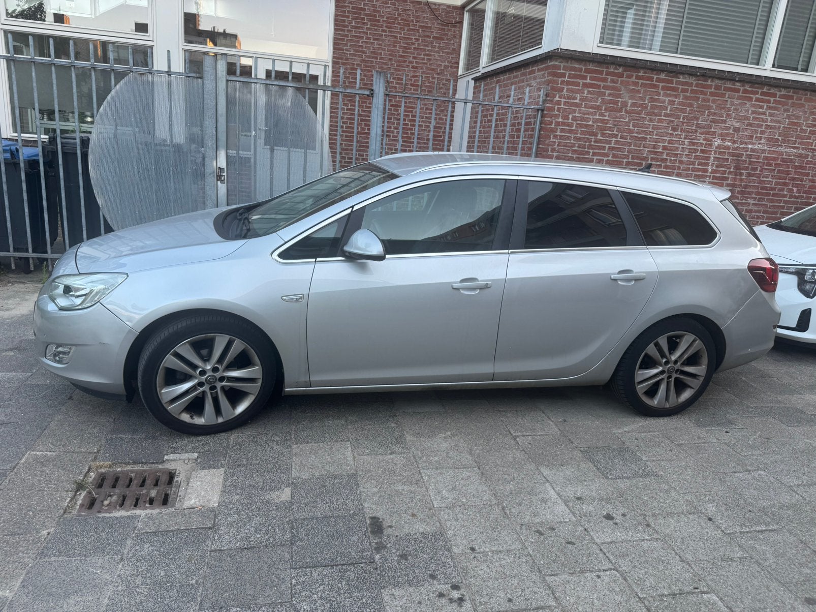 Opel Astra 1.4 Turbo 88KW Sports Tourer 2011 Grijs, Voorwielaandrijving, Euro 5, Zwart, 4 cilinders