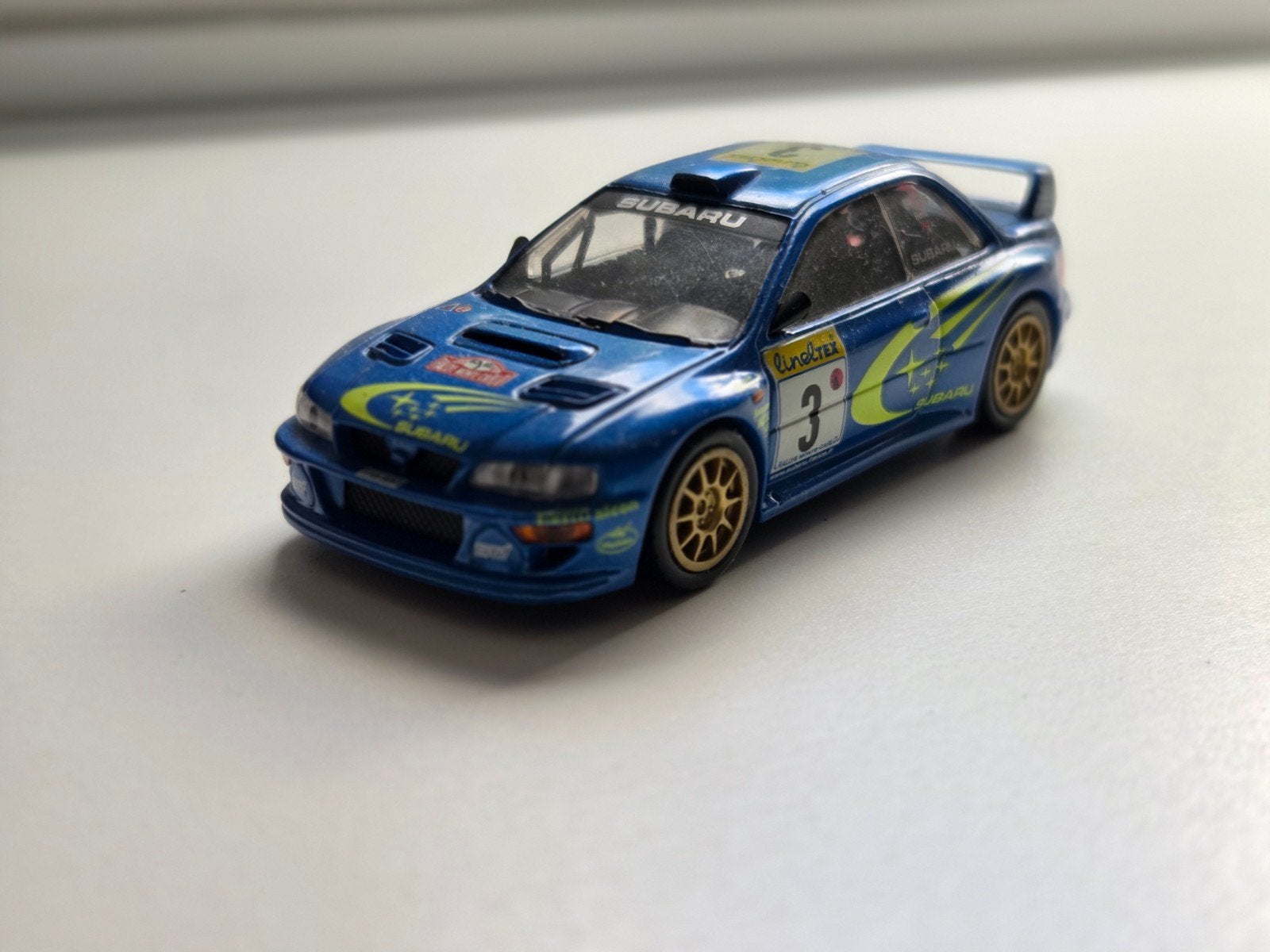 Subaru Impreza WRC Rally 1:43 modelauto, Ophalen of Verzenden, Zo goed als nieuw, Auto, Overige merken