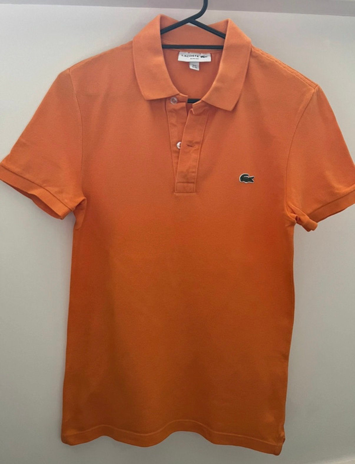 Lacoste Oranje originele polo jongen of uni Mt 2 is  XS, Kleding | Heren, Polo's, Ophalen of Verzenden, Nieuw, Maat 46 (S) of kleiner