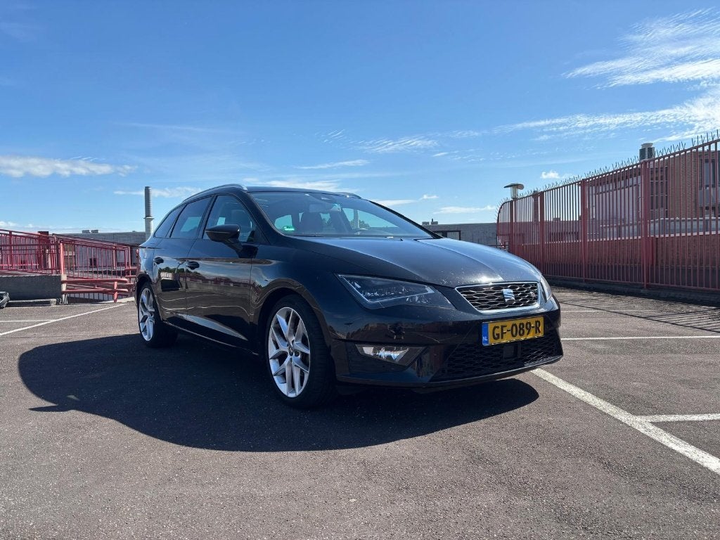 Seat Leon ST FR Dynamic 1.4 TSI 150pk 2015 Zwart, Auto's, Euro 5, Zwart, 4 cilinders, 150 pk