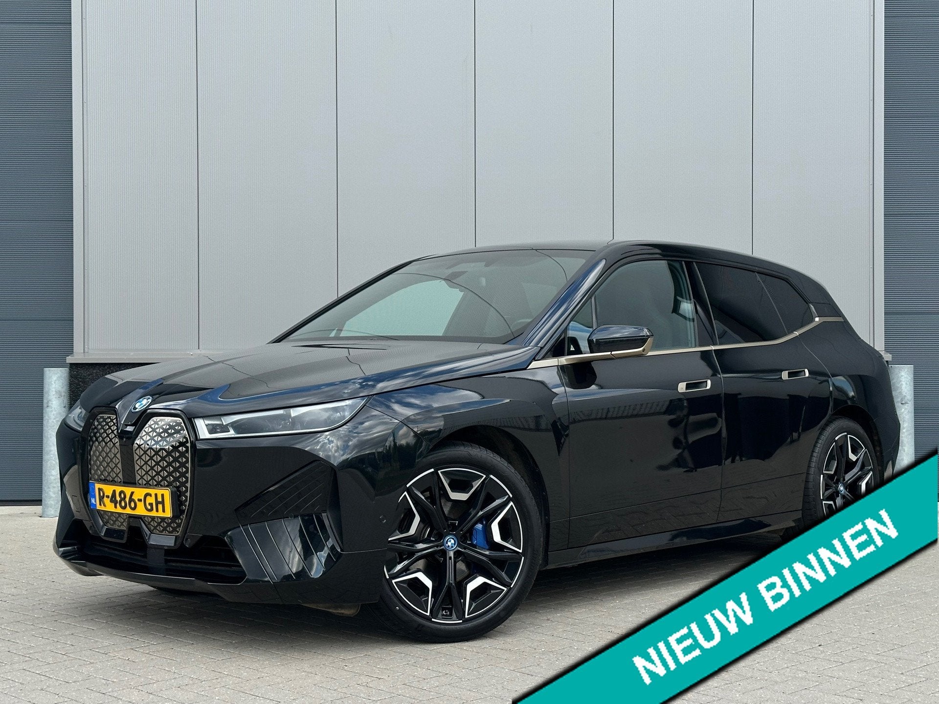 BMW IX XDrive40 Executive 77 kWh |100% SOH|LASER|PANO|GOLD|, Automaat, Gebruikt, Zwart, Vierwielaandrijving