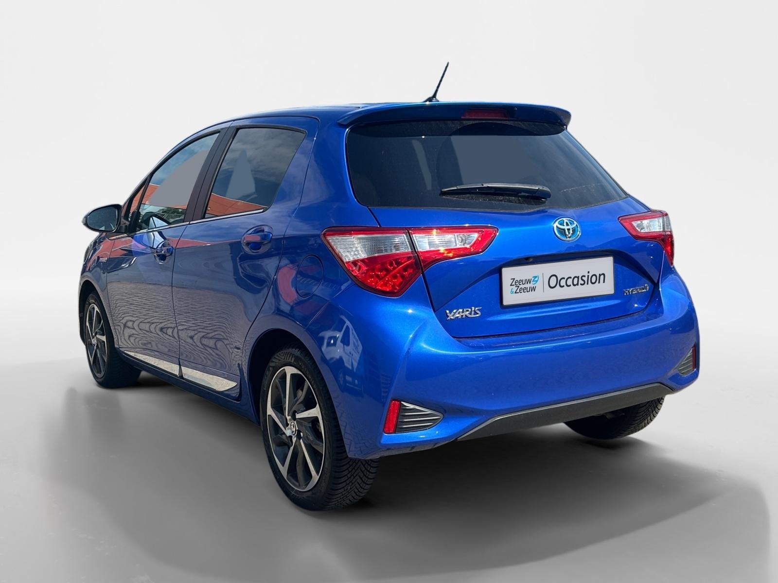 Toyota Yaris 1.5 Hybrid Bi-Tone |Automaat|climate controle|, Auto's, 12 maanden, Gebruikt, 4 cilinders, Blauw