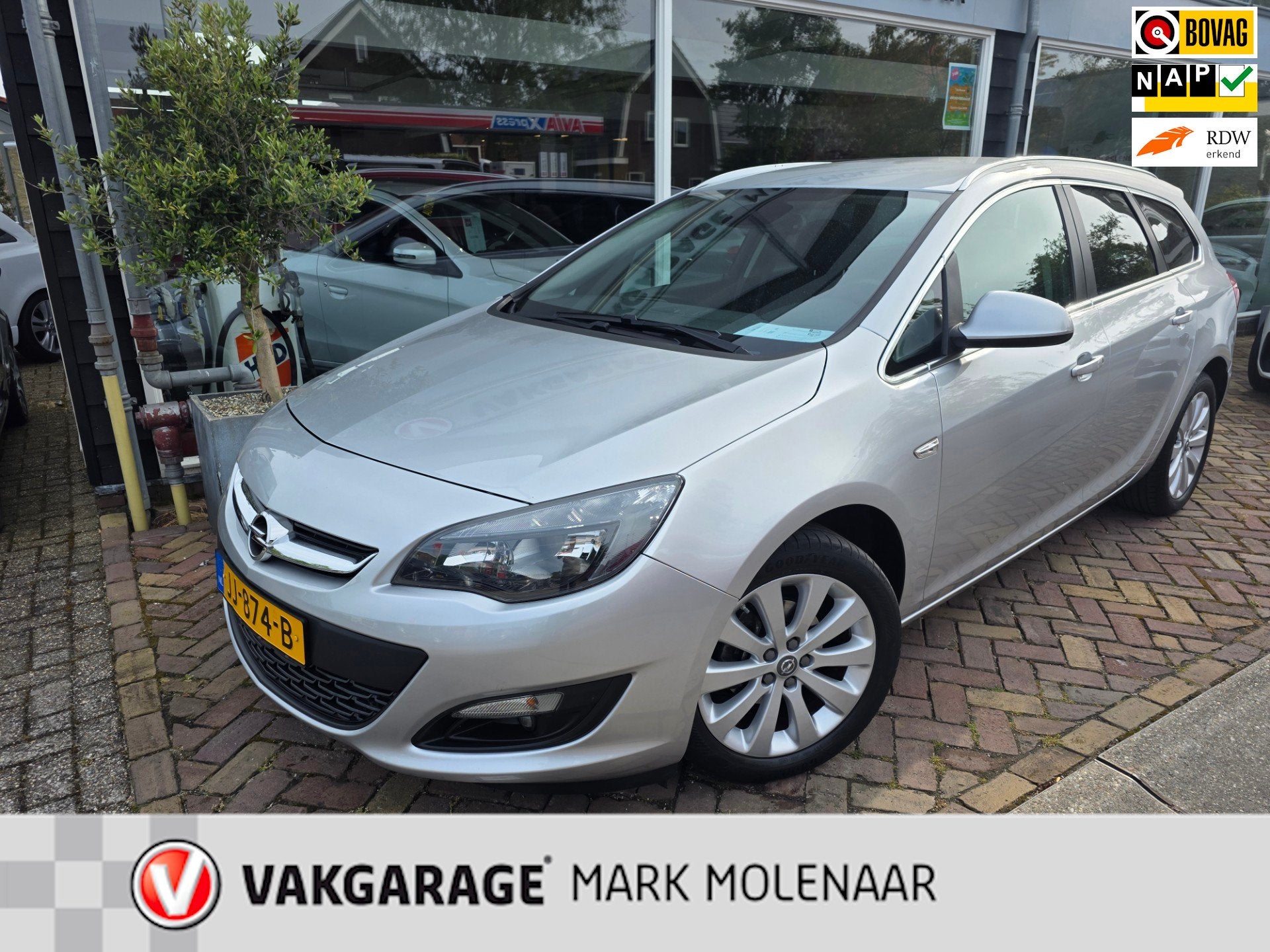 Opel Astra Sports Tourer 1.4 Turbo Blitz, Auto's, Gebruikt, Euro 6, 4 cilinders, Origineel Nederlands