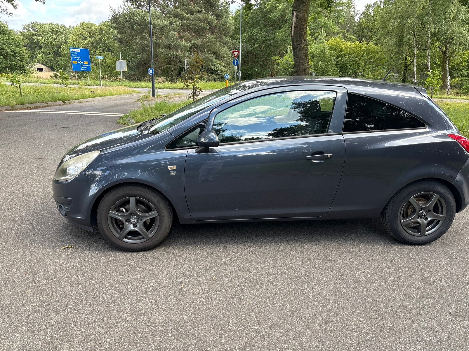 Foto 4 van Opel Corsa 1.2 Ecoflex 51KW 3D 2010 Grijs