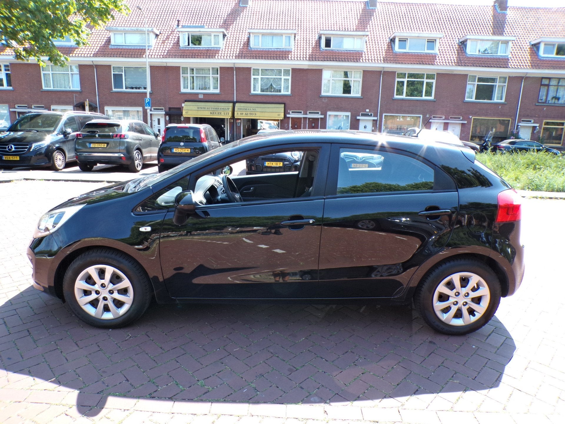 Kia Rio 1.2 CVVT Comfort Pack van 1e eigenaar (bj 2012), Euro 5, 4 cilinders, Elektrische ramen, Zwart
