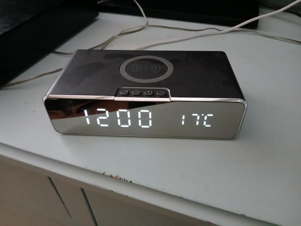 Wekker met draadloze oplader, Ophalen