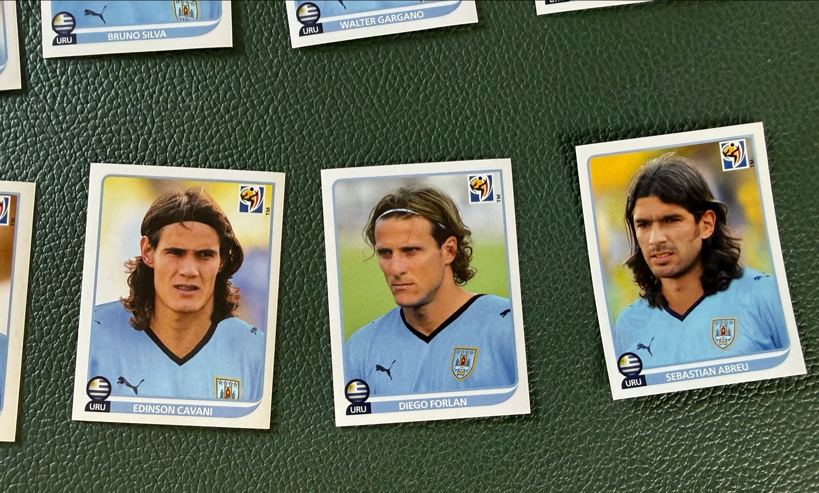 WK 2010 Uruguay Panini Stickers - Voetbalplaatjes, Ophalen of Verzenden, Zo goed als nieuw, Buitenlandse clubs, Poster, Plaatje of Sticker
