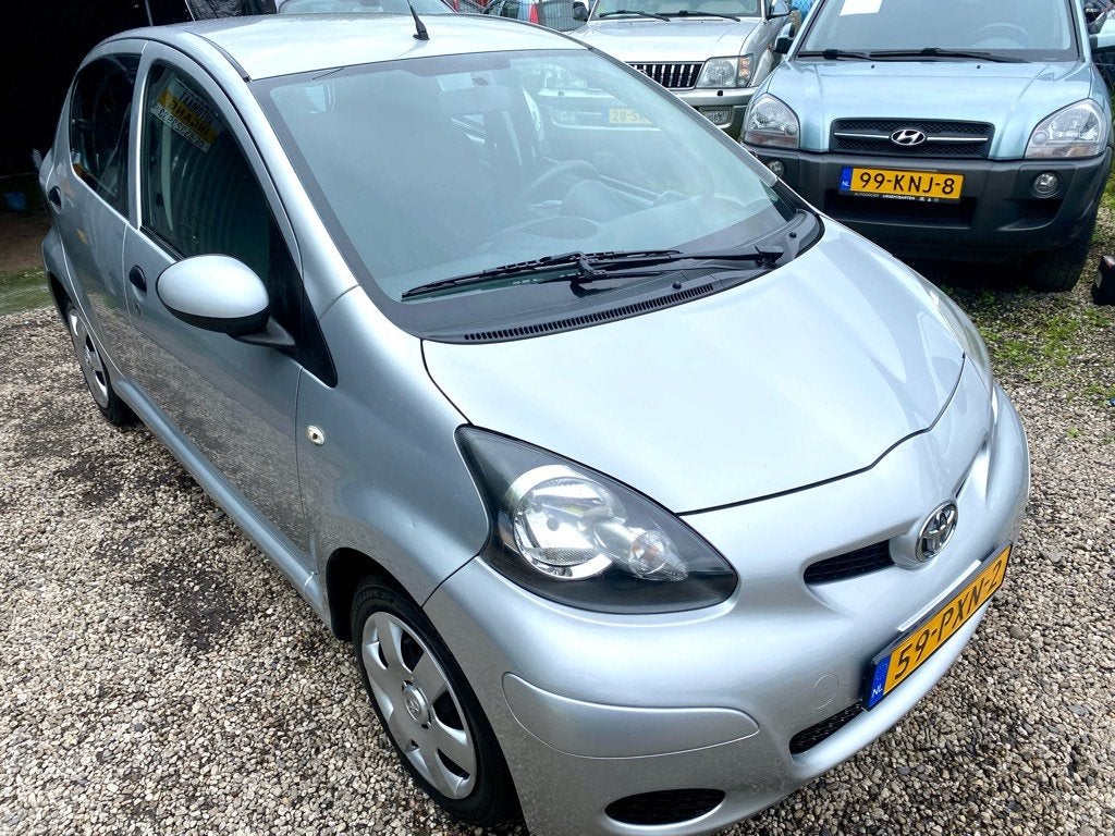 Toyota Aygo 1.0-12V Cool (bj 2011), Auto's, Voorwielaandrijving, Euro 5, Stof, Gebruikt