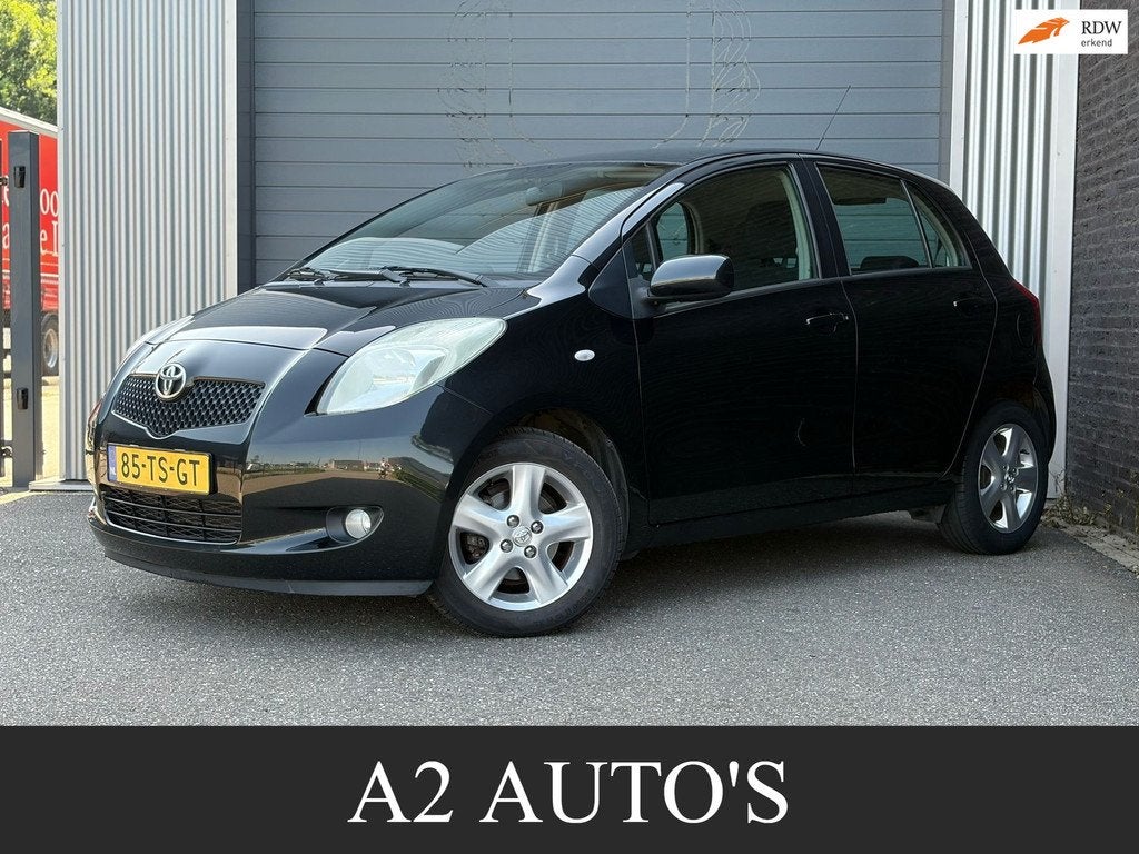 Toyota Yaris 1.3 VVTi Luna MMT Automaat|Ecc|Sensor, Auto's, Stof, 750 kg, 4 cilinders, Zwart