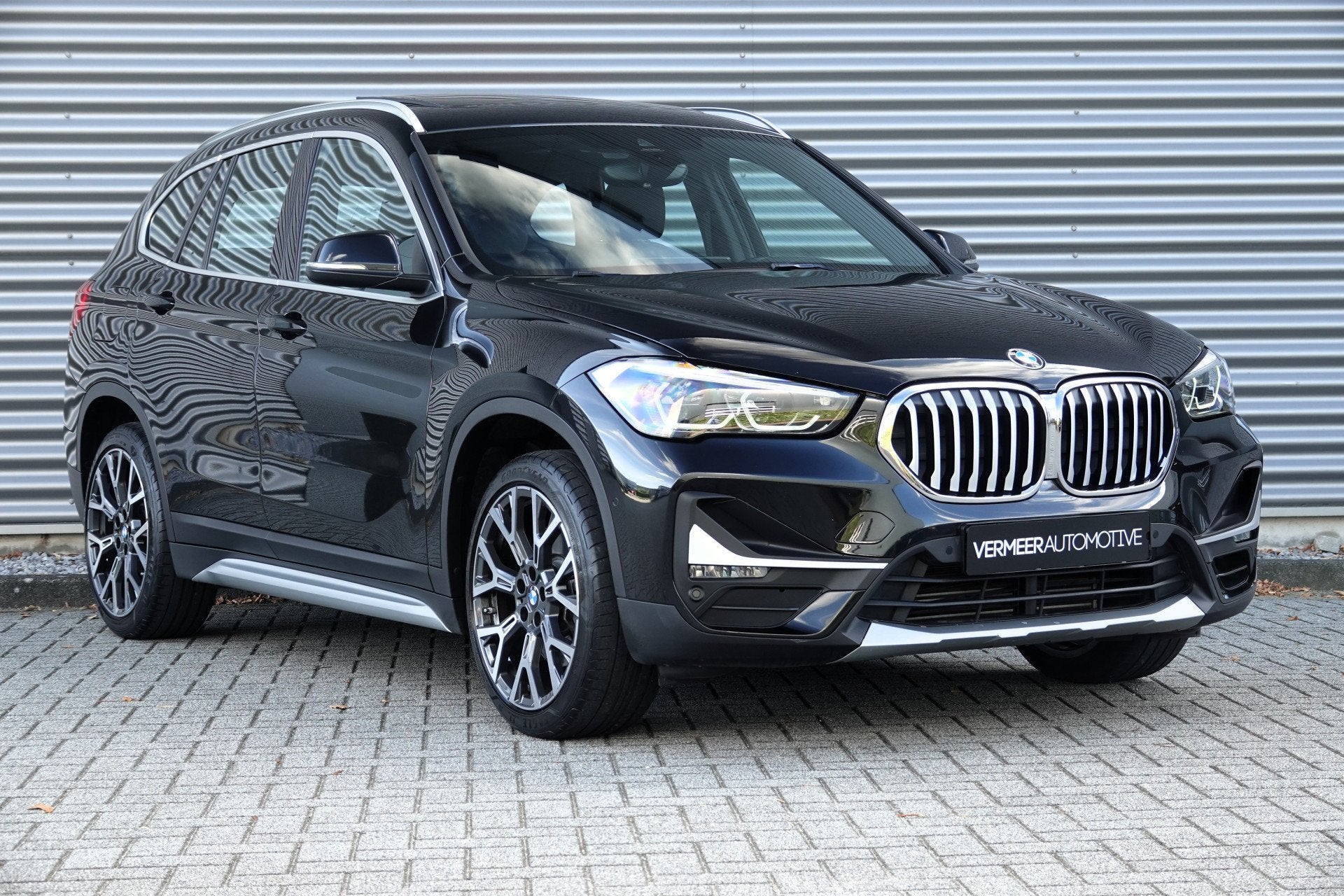 BMW X1 sDrive20i Orange Edition | Panoramadak | Head-up | Ca, Auto's, 4 cilinders, 179 pk, Zwart, Bedrijf