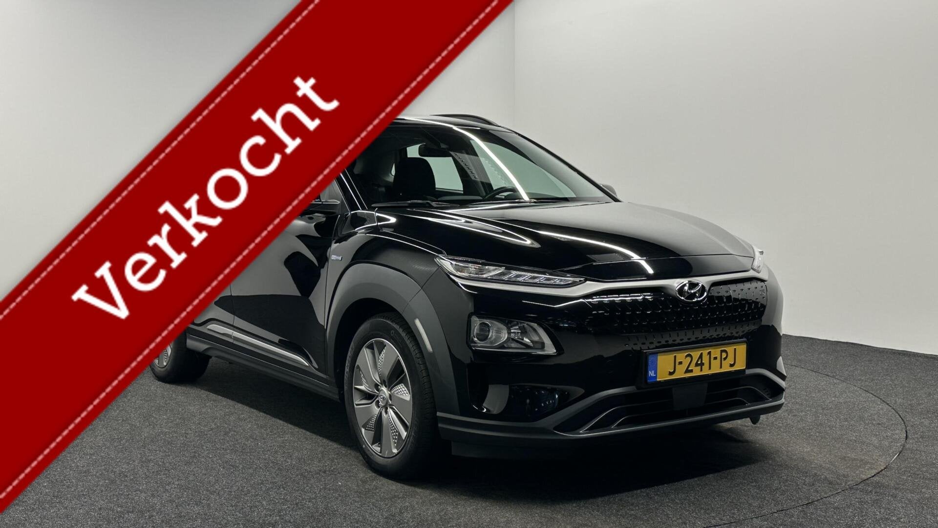 Hyundai Kona EV Comfort 64 kWh 3 Fase 100% SOH Warmtepomp CA, Auto's, Hyundai, Stof, Gebruikt, Met garantie (alle), Zwart