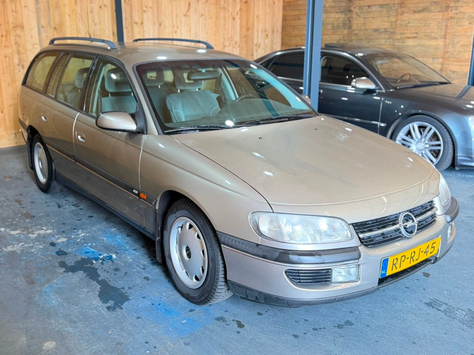 Opel Omega Wagon 2.5i V6 CD Business Automaat 1E Eigenaar, Auto's, Omega, Achterwielaandrijving, Gebruikt, 2498 cc