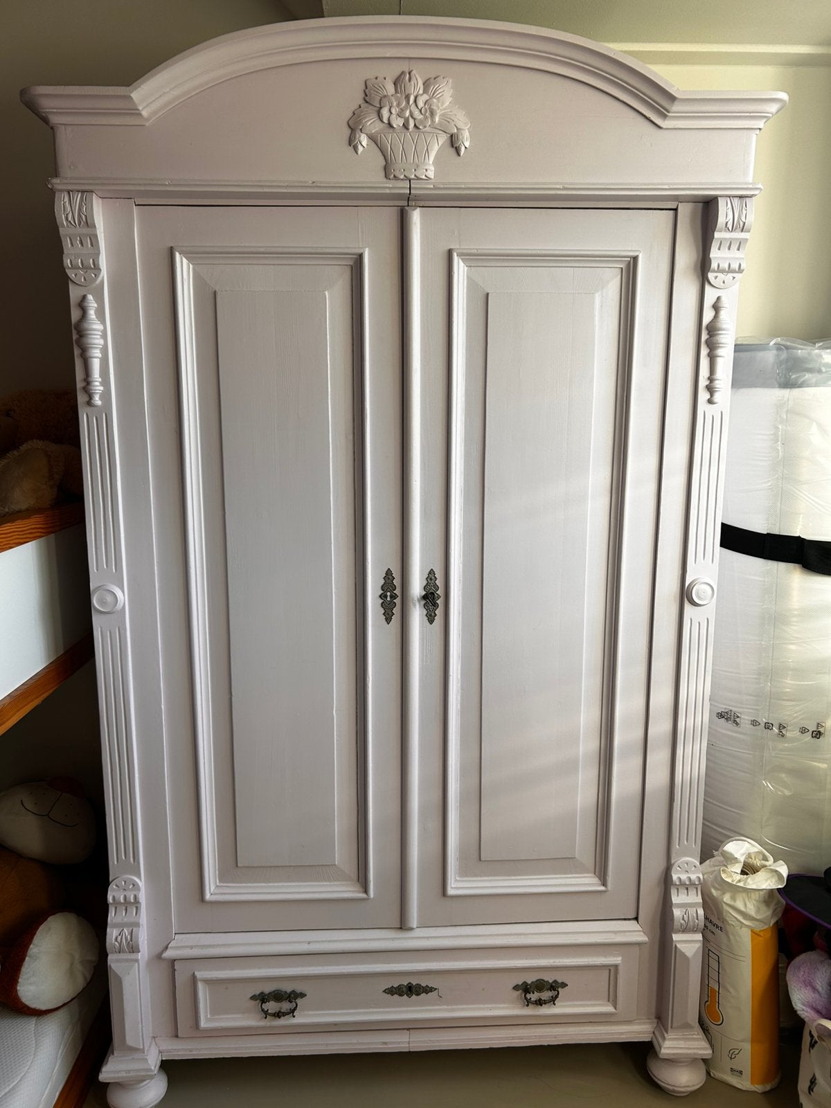 Antieke (kinderkleding) kast, Ophalen