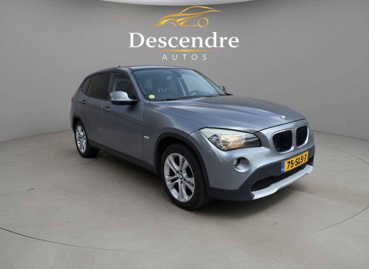 BMW X1 sDrive18d Executive (bj 2011), Auto's, BMW, X1, Euro 5, Zwart, 1445 kg