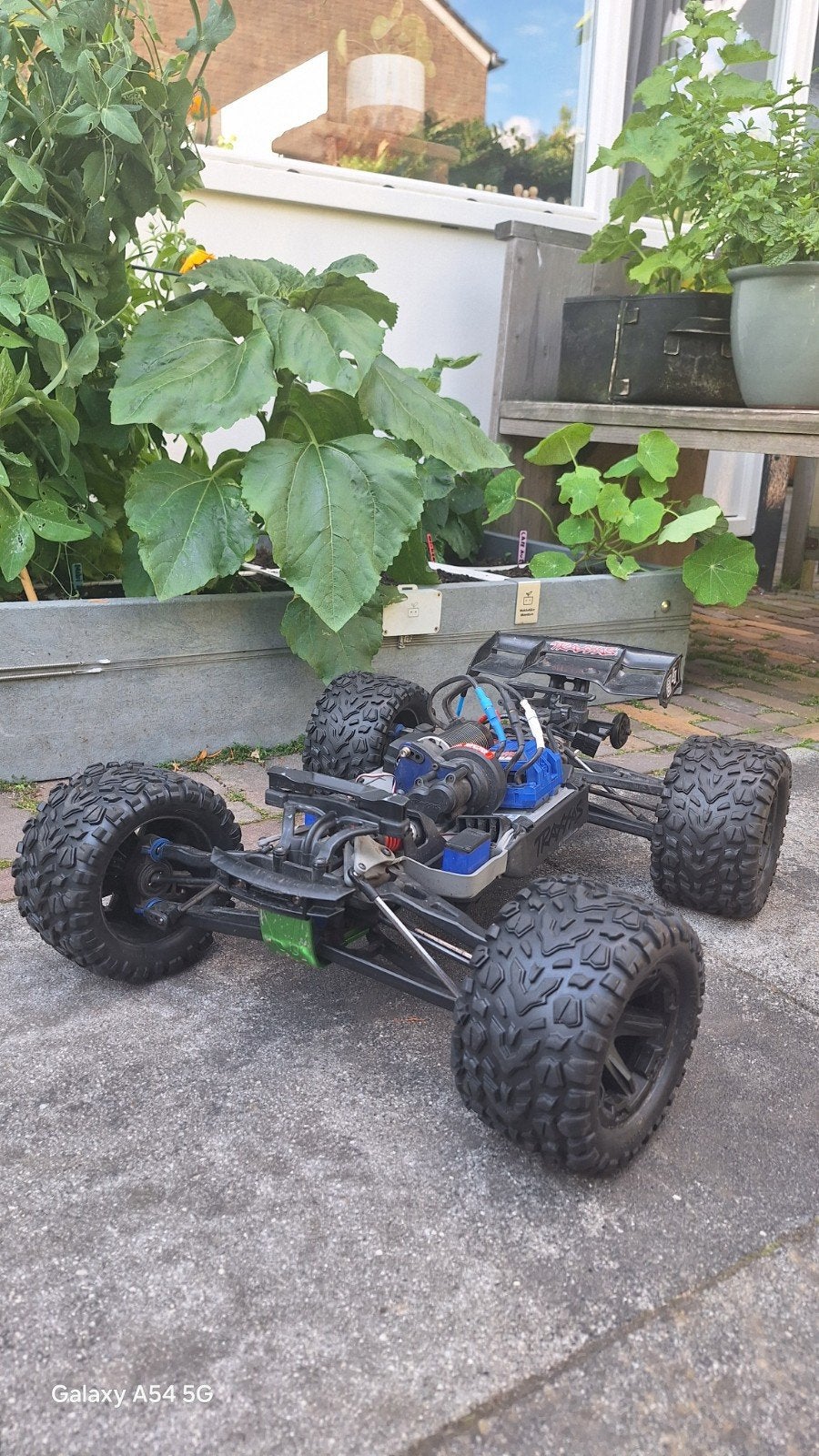Traxxas E-Revo VXL 1:8 RC Auto - Zo goed als nieuw, Hobby en Vrije tijd, Modelbouw | Radiografisch | Auto's, Ophalen of Verzenden