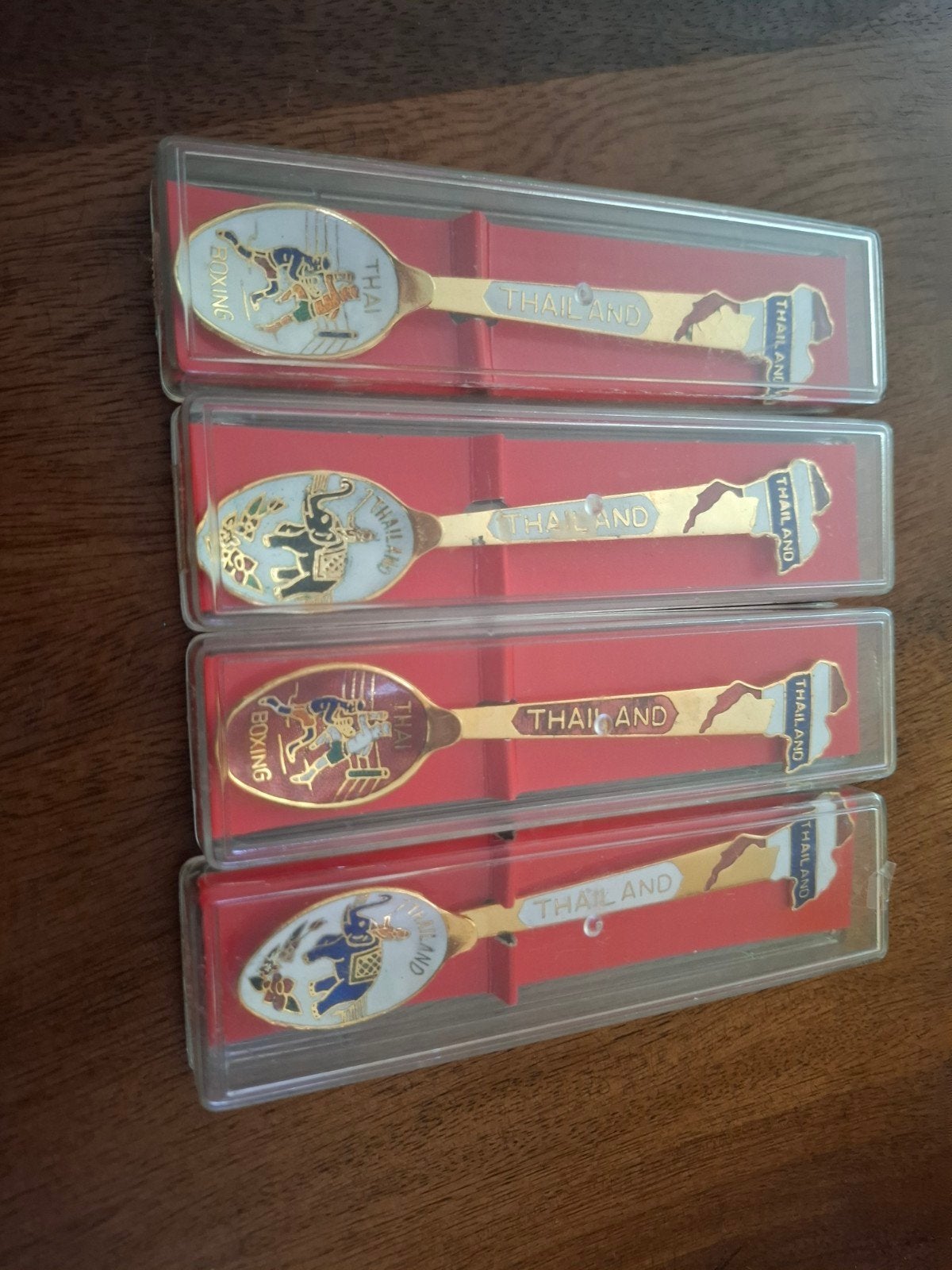 Set van 4 Thaise souvenirlepels - olifant en Thai boxing, Antiek en Kunst, Ophalen of Verzenden