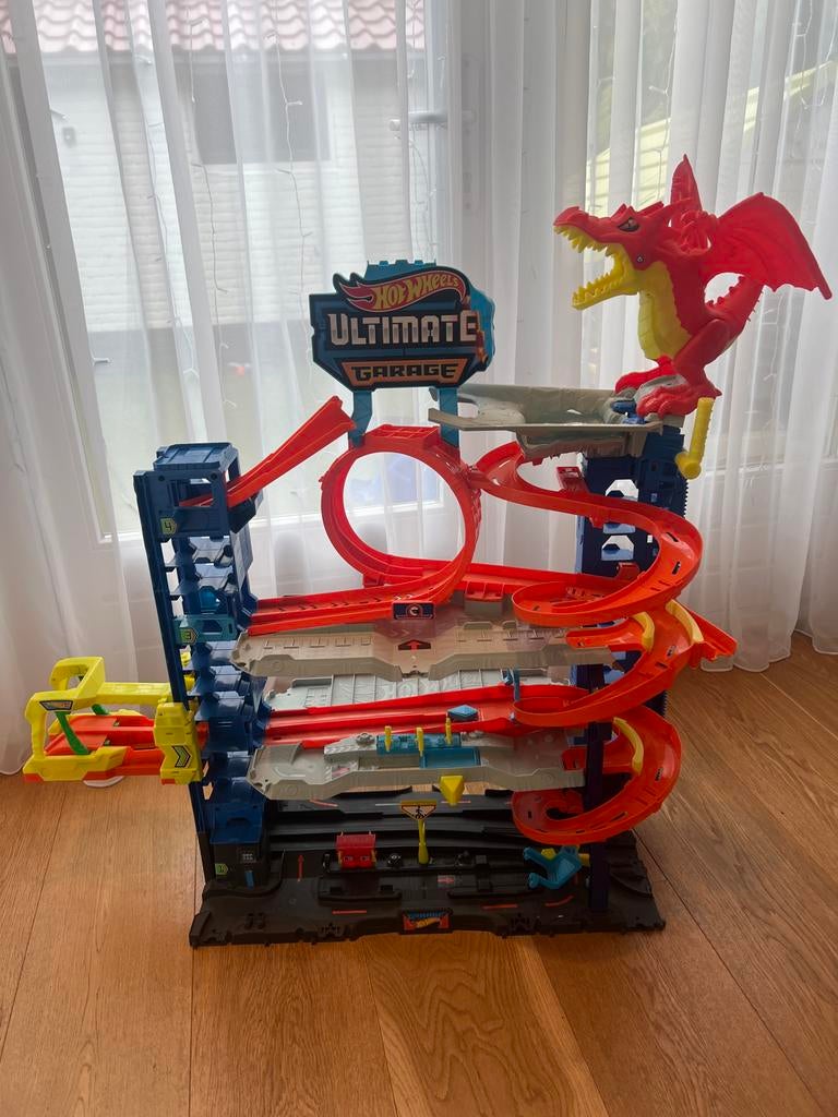 Hot Wheels Ultimate Garage met draak, Kinderen en Baby's, Speelgoed | Speelgoedvoertuigen, Zo goed als nieuw, Ophalen of Verzenden