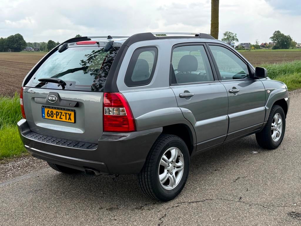 Kia Sportage 2.0 CVVT Comfort NAP APK 08-2026 Airco, 1442 kg, Stof, Gebruikt, 4 cilinders