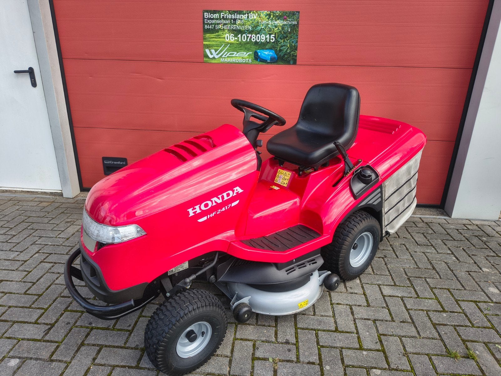 Zeer mooie Honda HF 2417 zitmaaier te koop, Tuin en Terras, Ophalen, Honda, Zo goed als nieuw, Elektrische starter