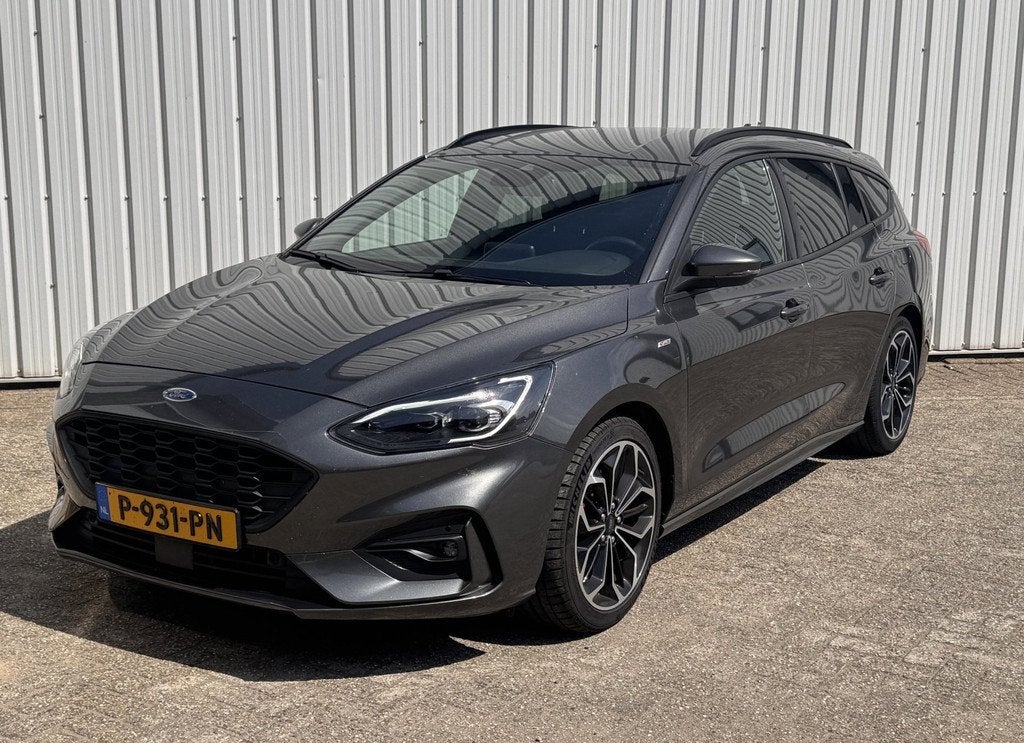 Ford Focus 1.0 EcoBoost Hybrid ST Line Camera / 18 inch / Na, Auto's, Ford, Gebruikt, Zwart, Origineel Nederlands, 19 km/l