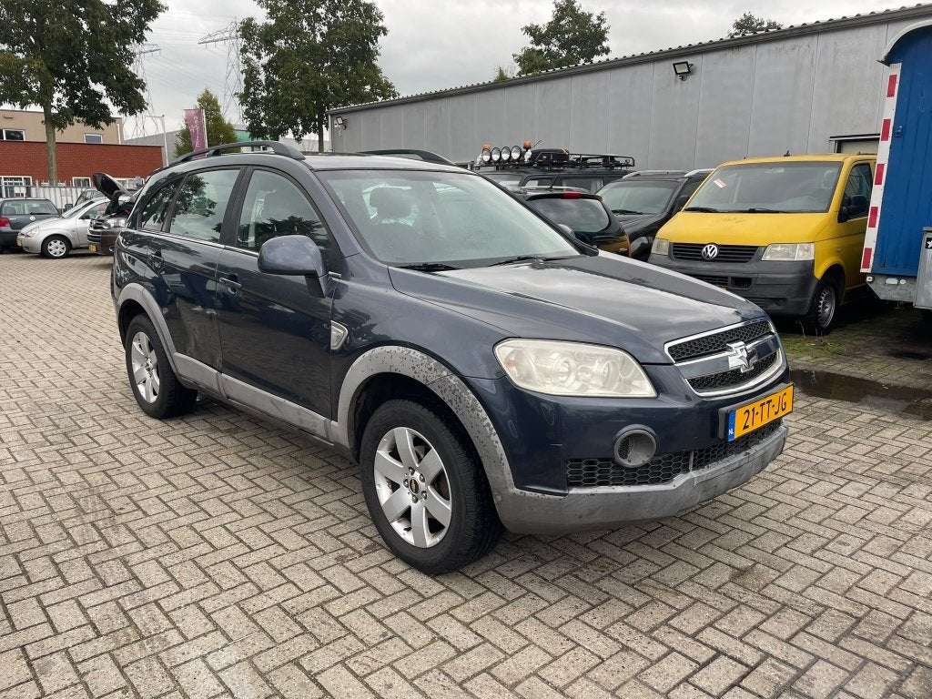Chevrolet Captiva 2.4i Style 2WD, Auto's, Gebruikt, 4 cilinders, 7 stoelen, Bedrijf