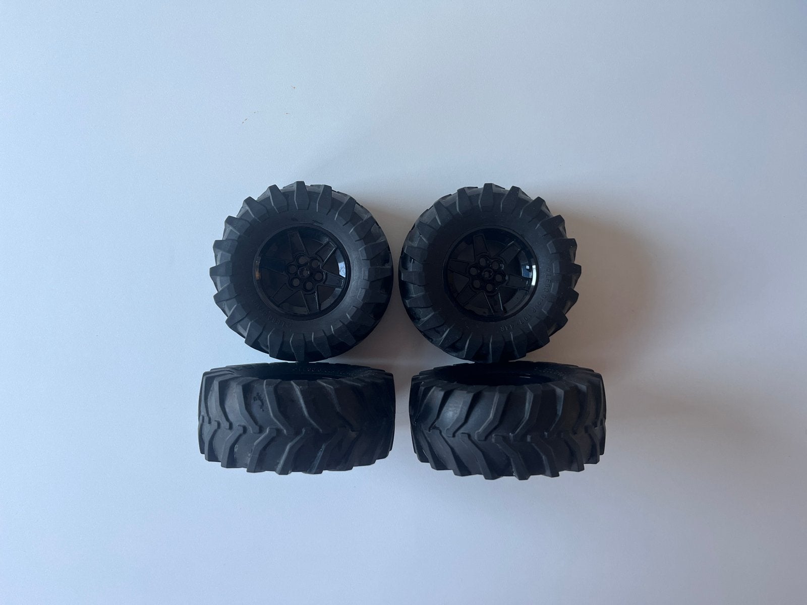 LEGO Technic 107 x 44R Tractor Tire  Black Wheels, 4 tires, Ophalen of Verzenden, Zo goed als nieuw, Staal, Oor- of Traguspiercing
