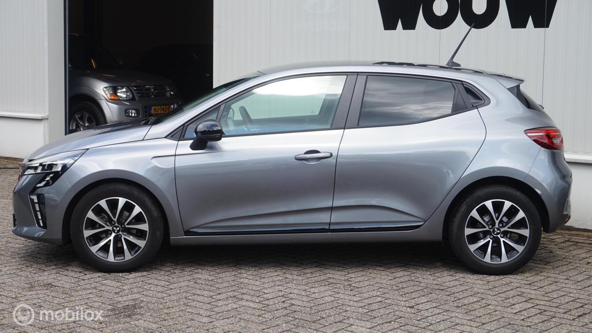 Mitsubishi Colt 1.0T MT Intense Apple Carplay/Android Auto |, Stof, Gebruikt, Met garantie (alle), 1072 kg