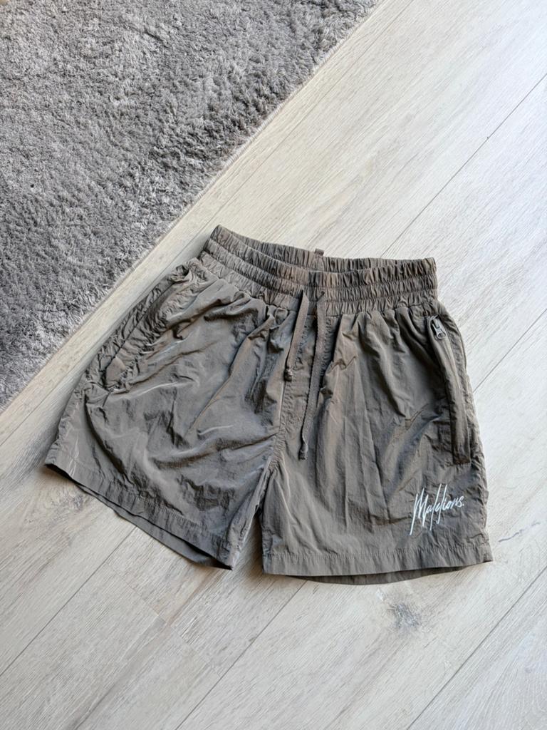 Zwembroek Malelions, Ophalen of Verzenden, Zo goed als nieuw, Jongen, Sport- of Zwemkleding