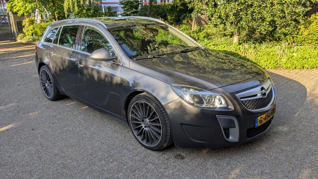 Opel Insignia 2.8 V6 Sport Tourer OPC, Auto's, Opel, Euro 5, Skiluik, Zwart, Leder