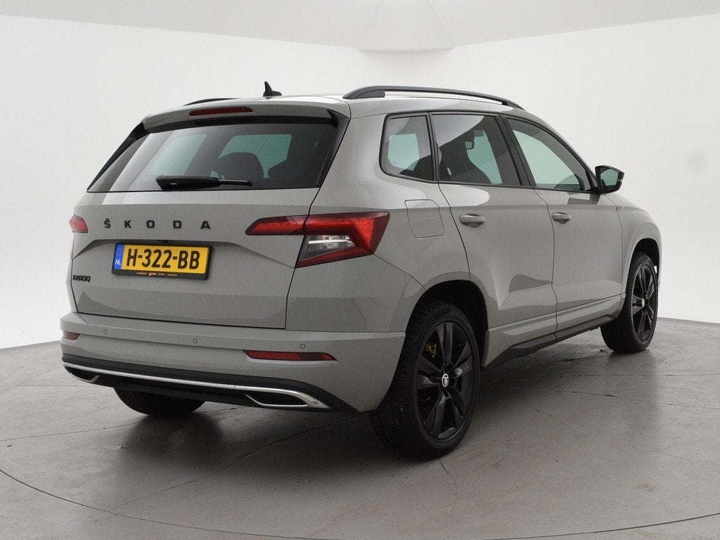 Skoda Karoq 1.5 TSI ACT SPORTLINE + WEGKL. TREKHAAK | VOL LE, Stof, 150 pk, Bedrijf, 690 kg