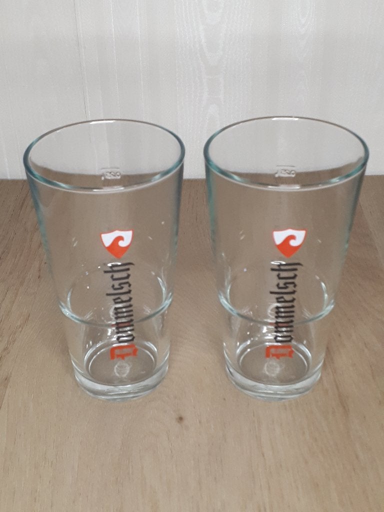 2 st. bierglazen Dommelsch (nieuw), Ophalen of Verzenden, Nieuw, Bierglas