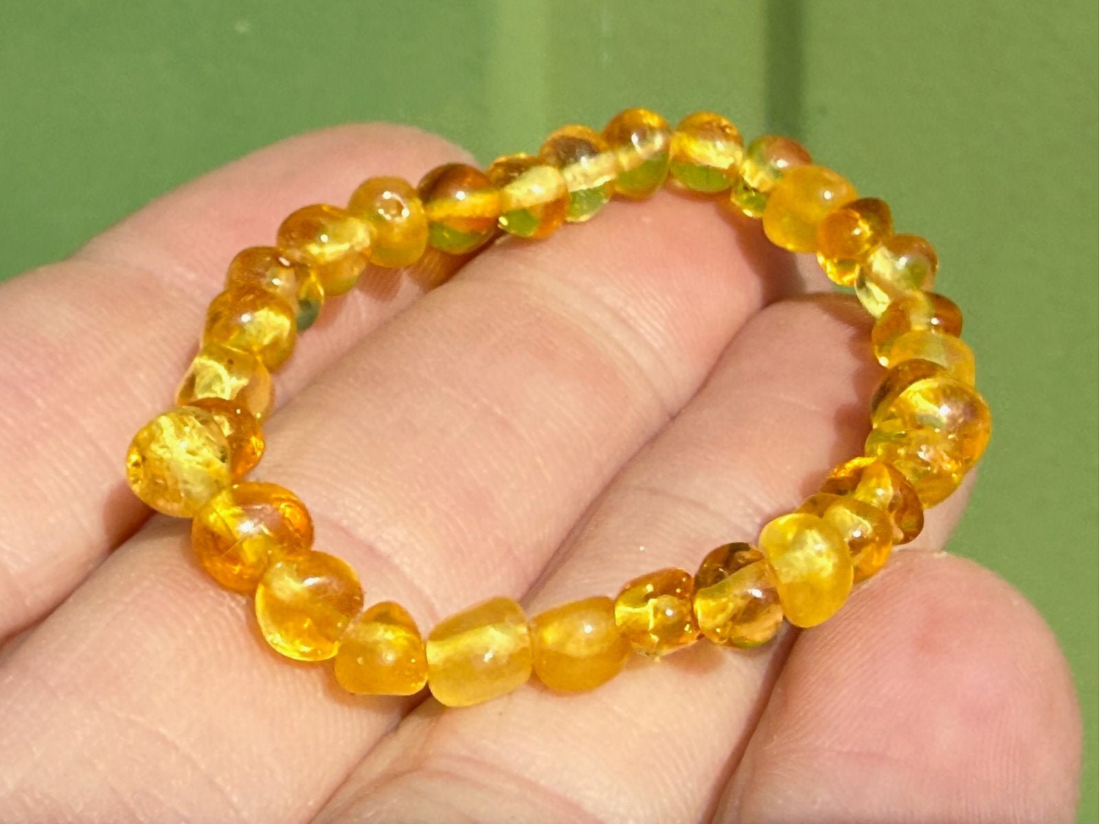 Barnsteen armband enkelbandje baby, Ophalen of Verzenden, Mineraal