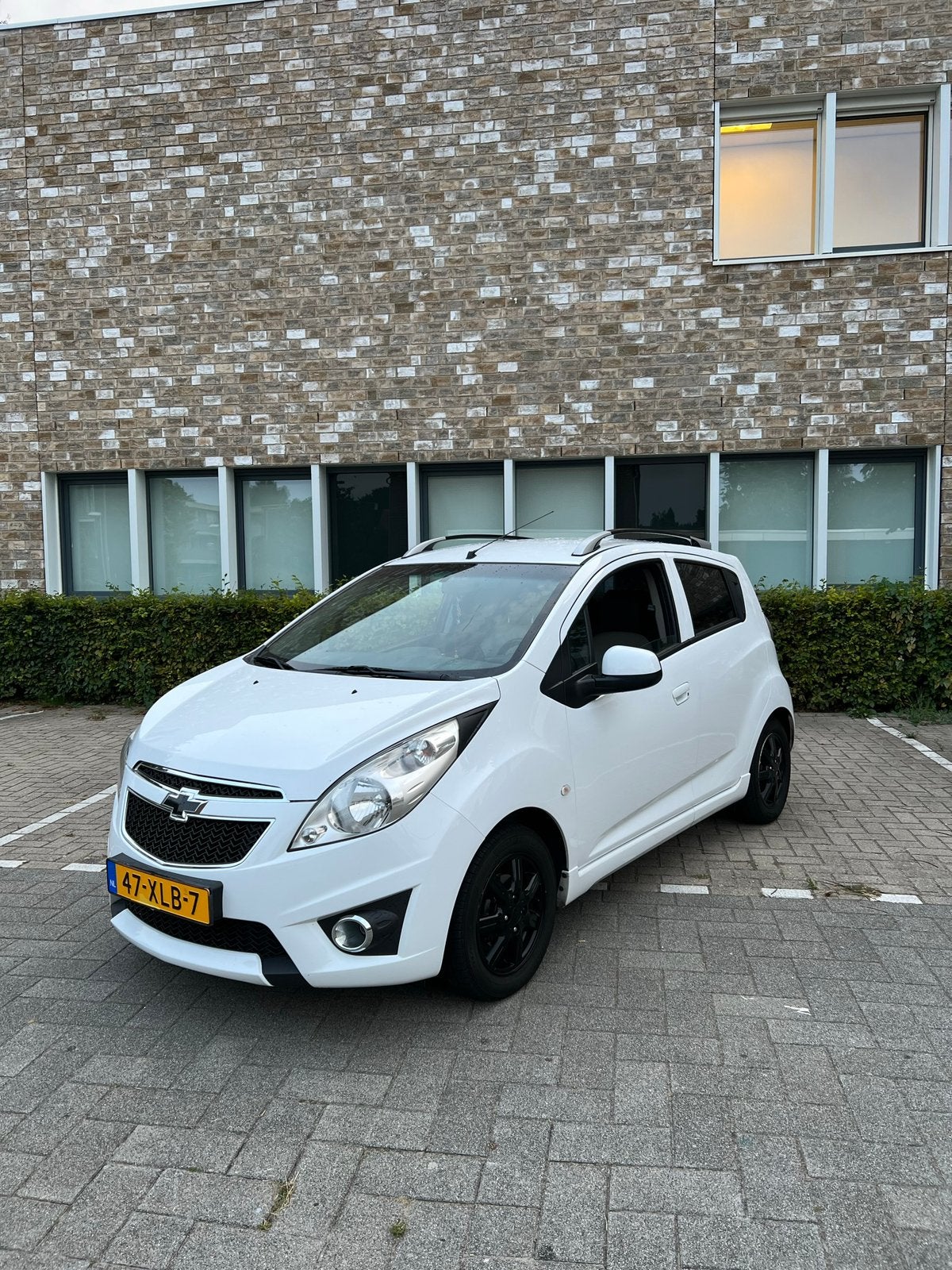 Chevrolet Spark 1.0 Bifuel 2012 Wit, Auto's, 15 km/l, 4 cilinders, Wit, Overige kleuren
