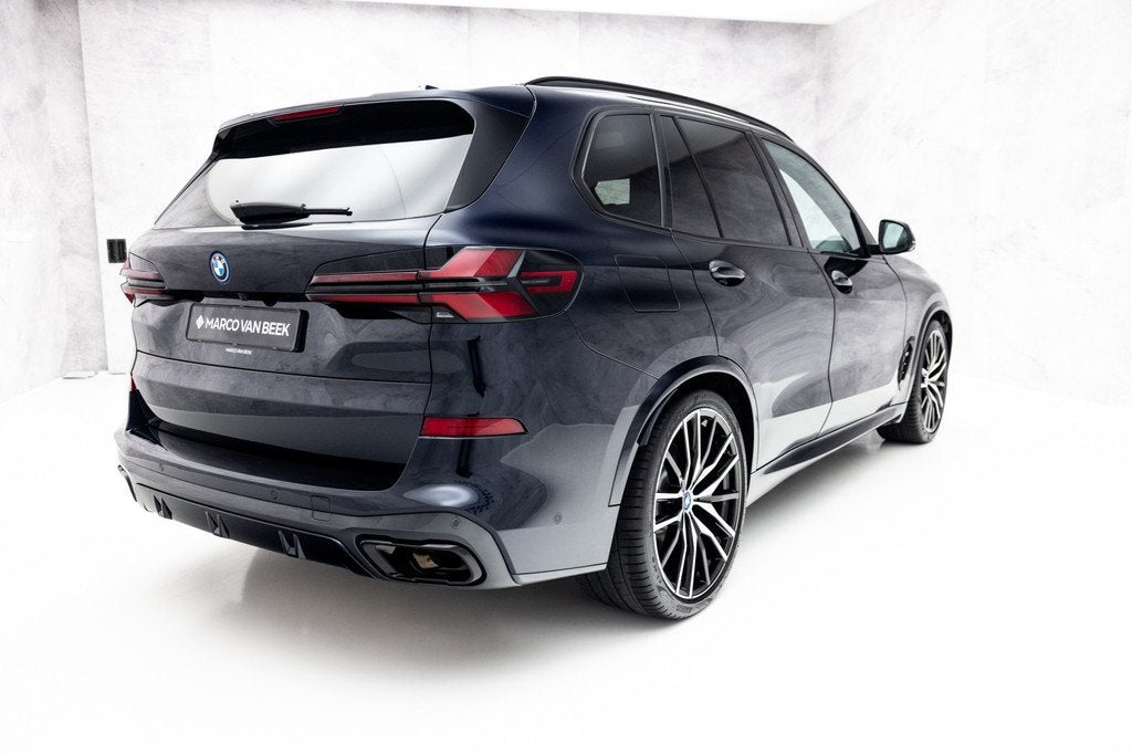 BMW X5 xDrive50e | M-Sport | Pano | 22" | Individual | Harma, 12 maanden, Gebruikt, 2395 kg, Zwart