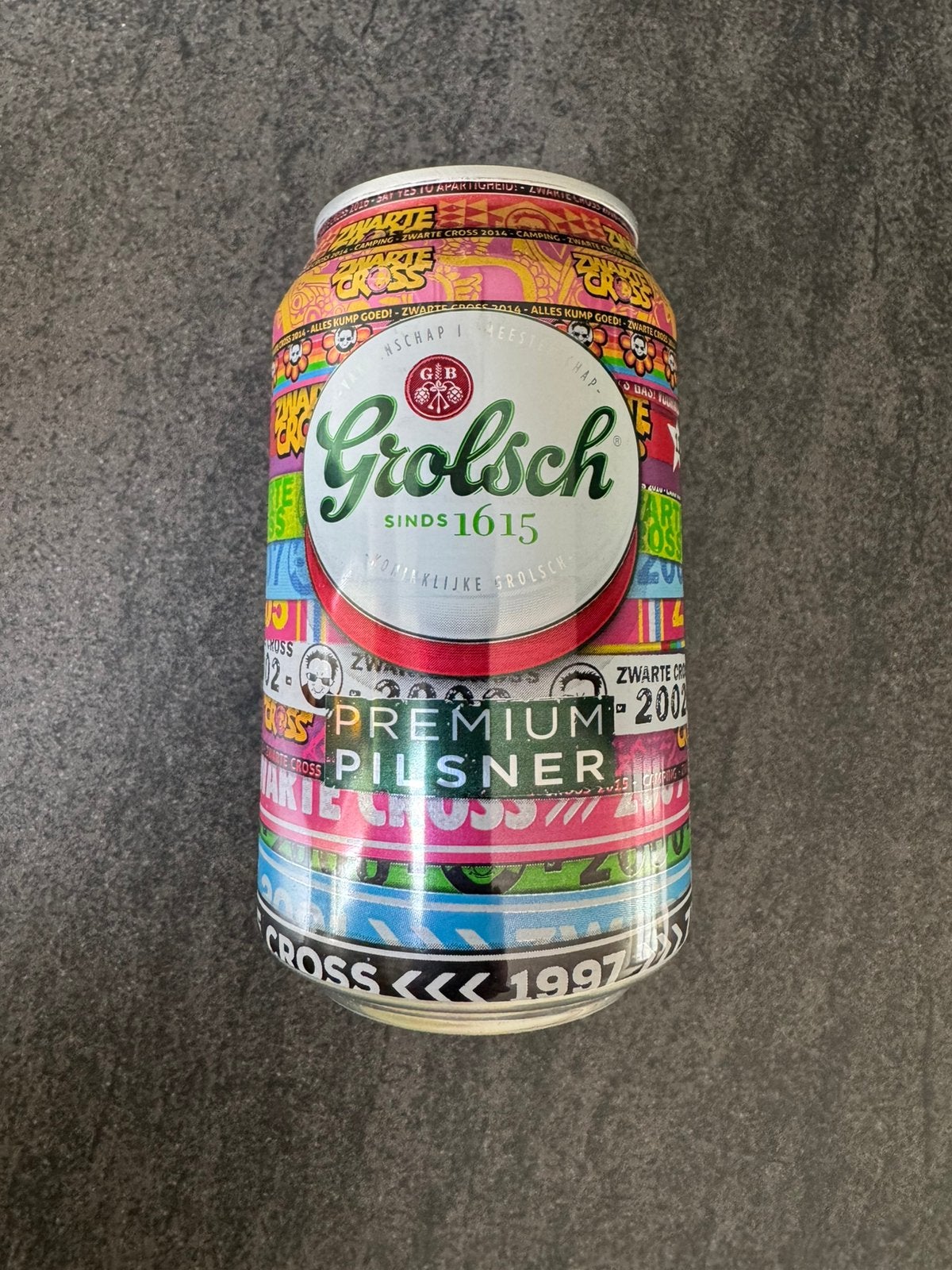 Grolsch Zwarte Crosse bierblik met festivalbandjes-design, Ophalen of Verzenden, Nieuw, Overige typen, Grolsch