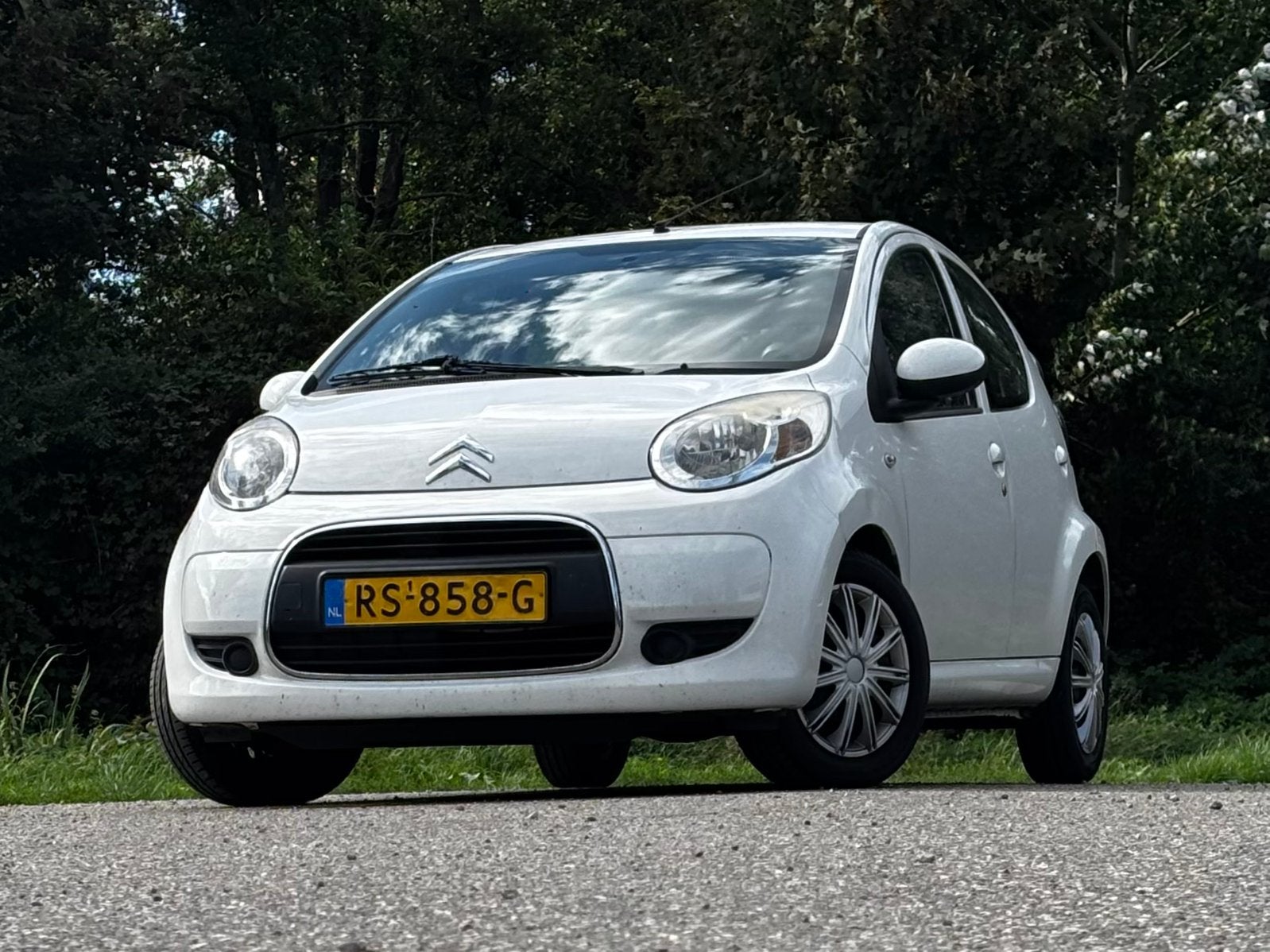 Citroën C1 1.0i 68PK 5D 2011 Wit, Auto's, Voorwielaandrijving, Stof, Zwart, 4 stoelen