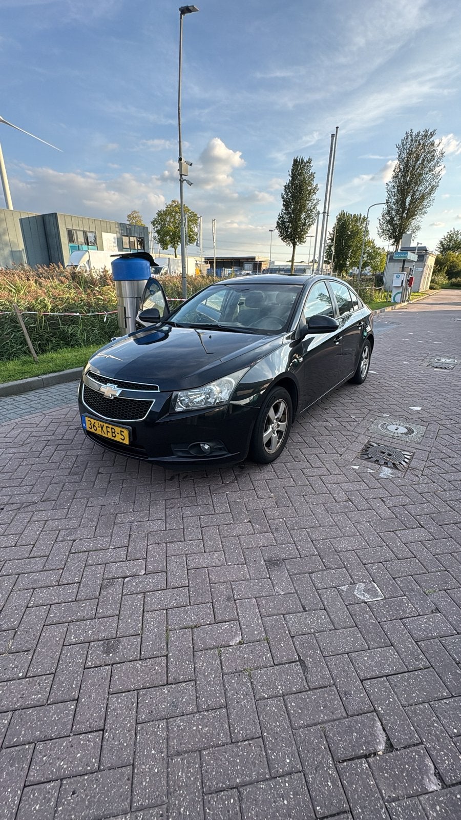 Chevrolet Cruze 1.6 2009 Zwart, Auto's, Voorwielaandrijving, 15 km/l, 680 kg, 4 cilinders