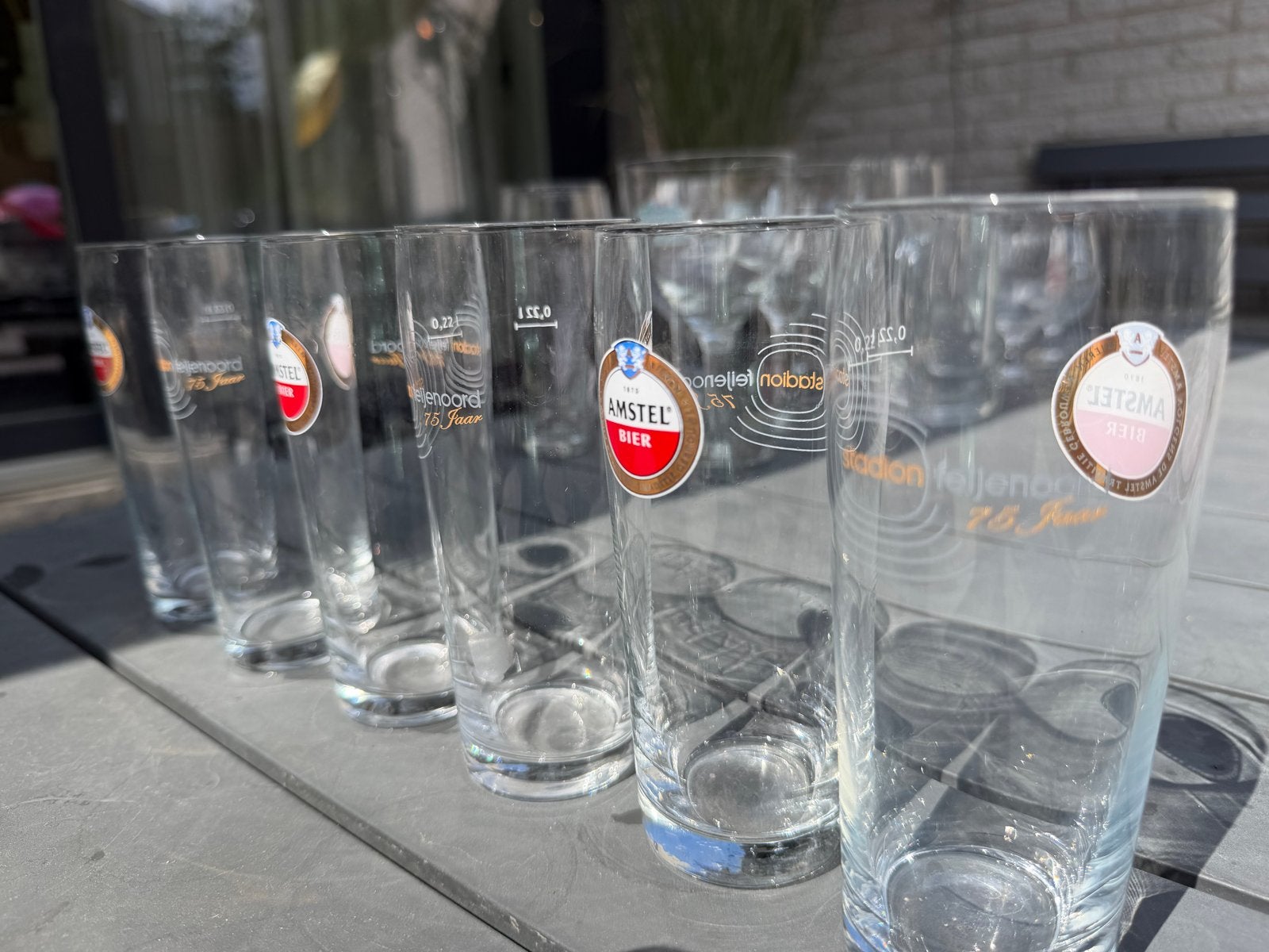 Amstel bierglazen 0.22L - Stadion Feyenoord 75 jaar, Ophalen, Meerkleurig, Overige merken, Glas