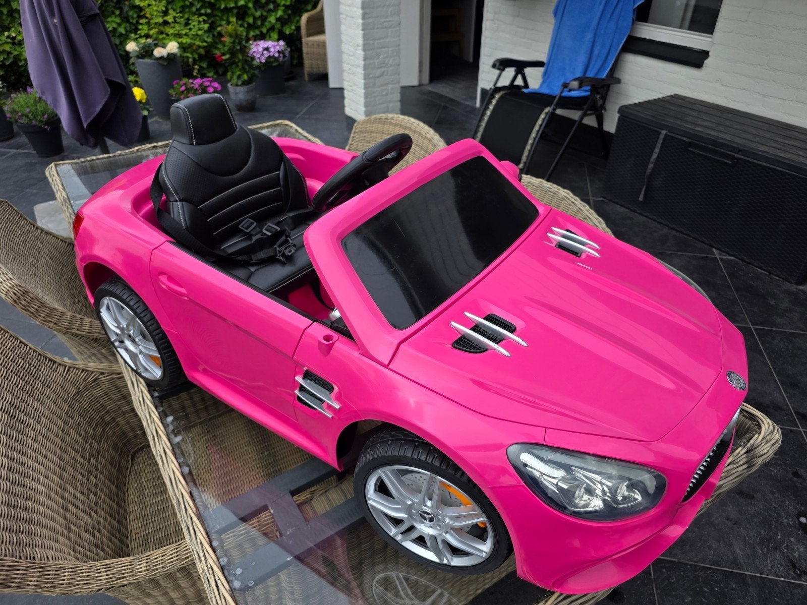 Roze Mercedes-Benz SL500 Elektrische Kinderauto, Ophalen of Verzenden, Zo goed als nieuw, Loopvoertuig