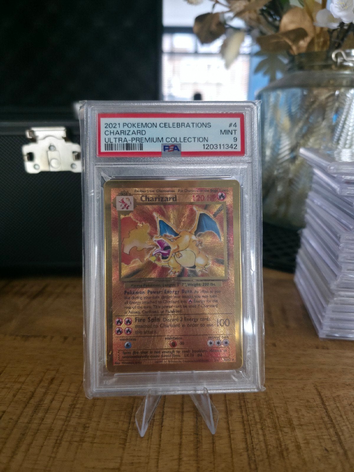 Charizard #4 Celebrations UPC PSA 9 Mint [METAL], Ophalen of Verzenden, Zo goed als nieuw, Losse kaart, Foil