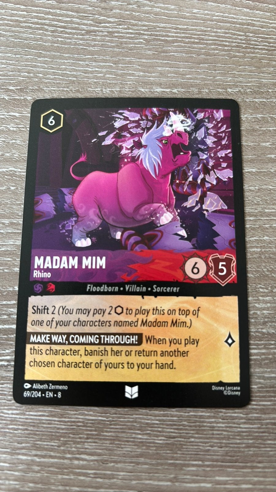 Disney Lorcana Madam Mim Rhino 69-204 8JAF nonfoil, Ophalen of Verzenden, Zo goed als nieuw
