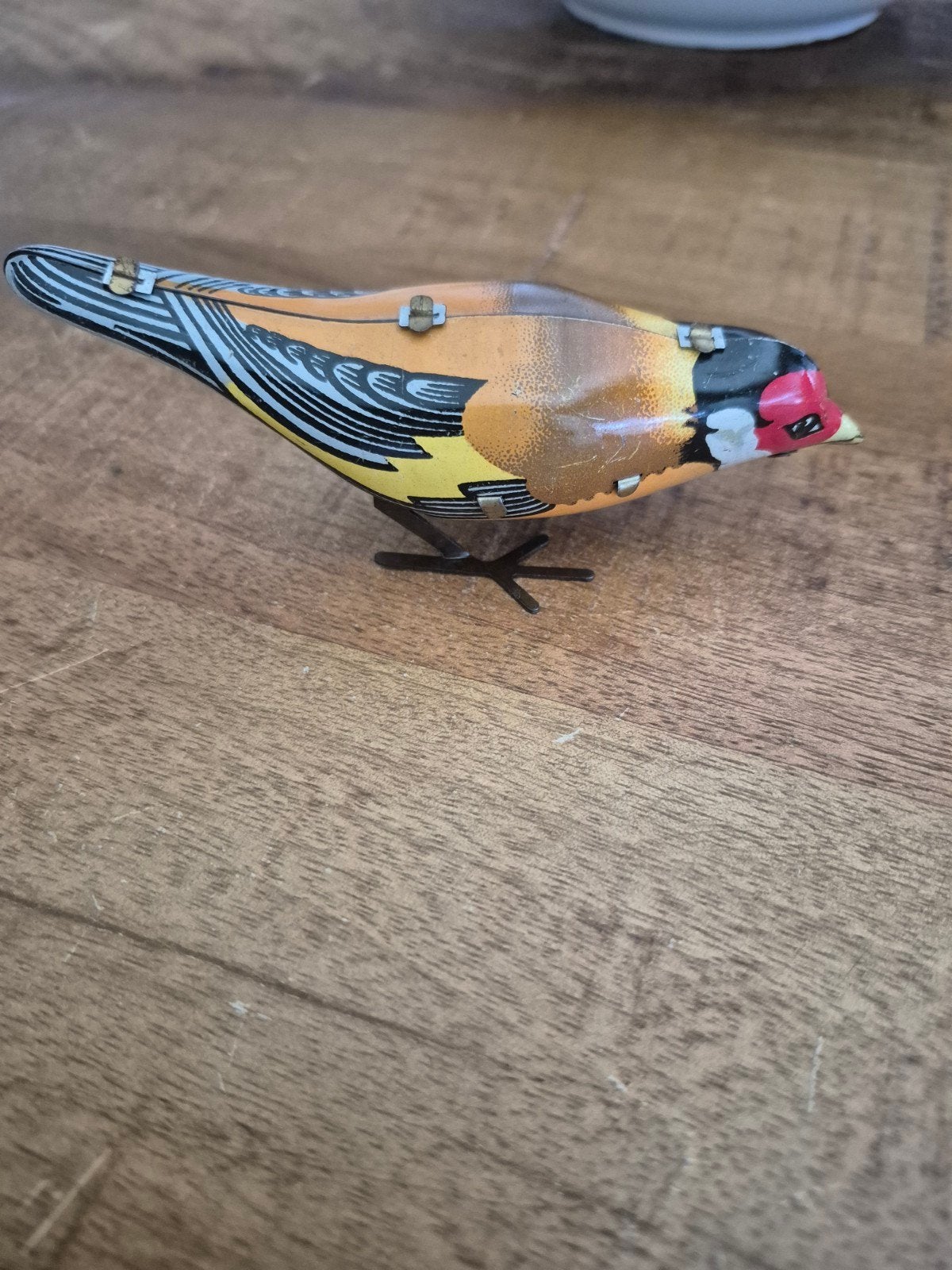 antieke vogel speelgoed, Ophalen