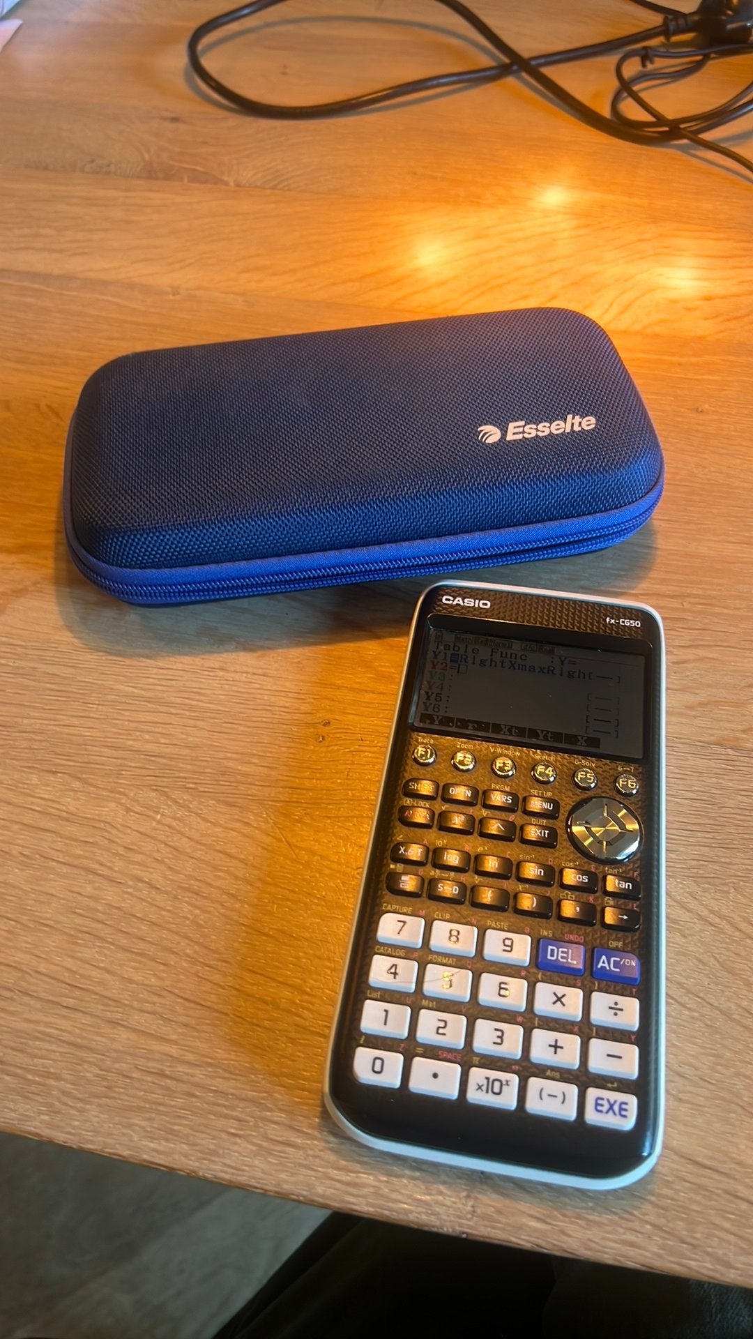 Casio calculator fx-CG50 incl hoes, Ophalen of Verzenden, Zo goed als nieuw