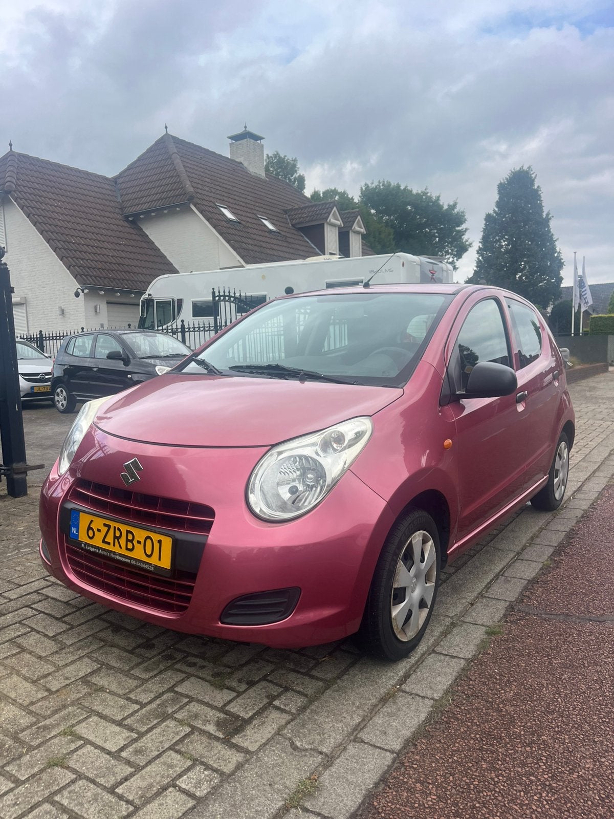 Suzuki Alto 1.0 2009 Rood, Voorwielaandrijving, Stof, 4 stoelen, Handgeschakeld