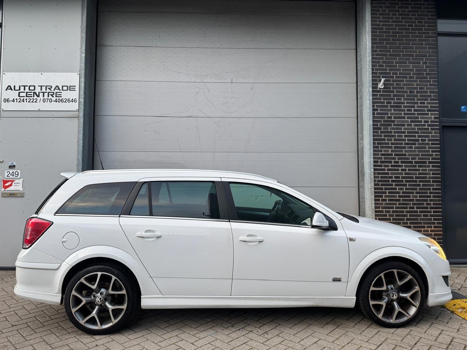 Opel Astra Wagon 1.6 Cosmo OPC Line, Auto's, Voorwielaandrijving, Gebruikt, Zwart, 116 pk